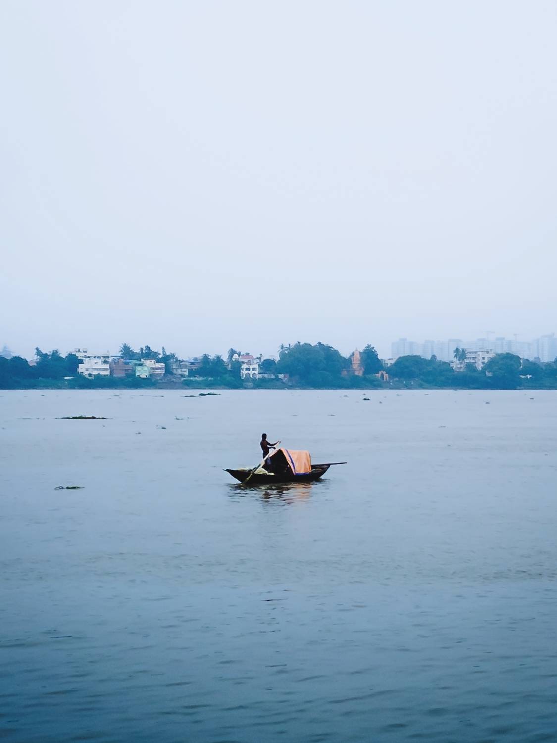 Solitary Voyage on the Misty River