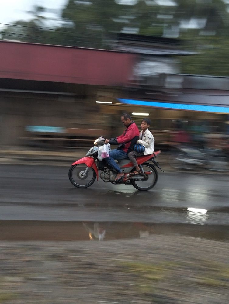 Father and Son Together in A Riide