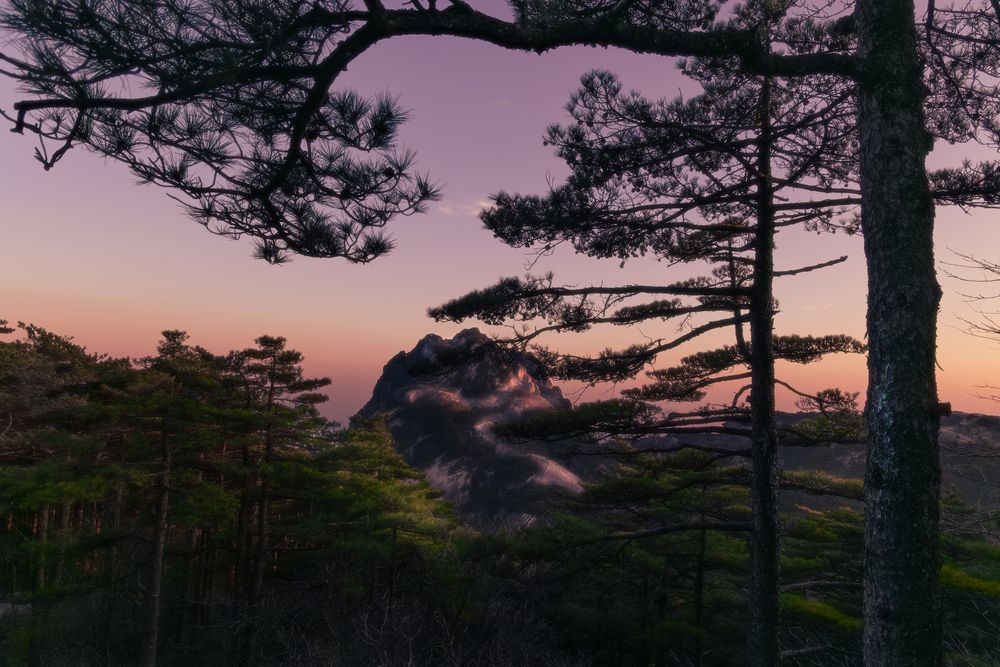 Twilight dyes the mountain peaks