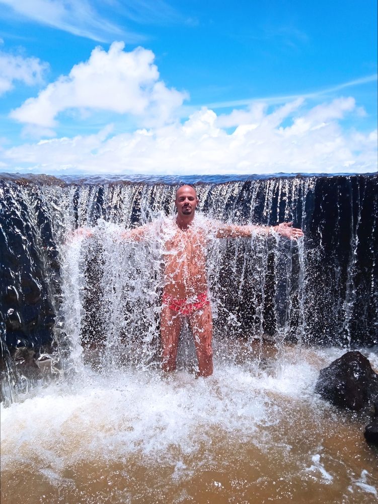 A refreshing swim under a blue sky.