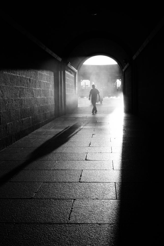 A man walking in the light