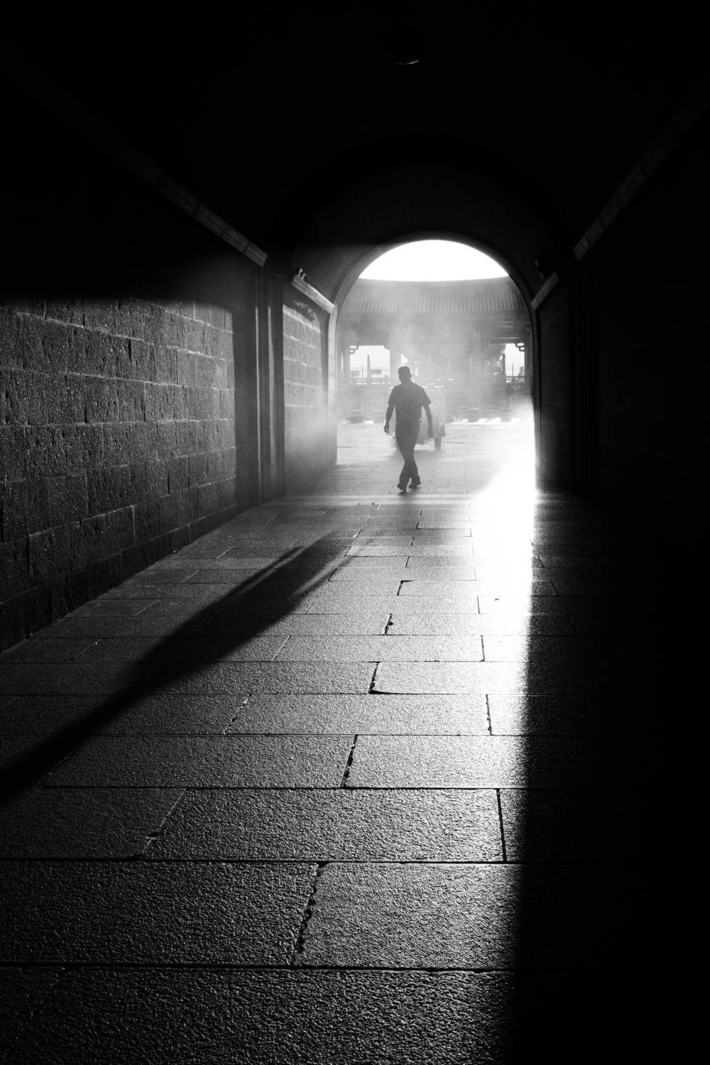 A man walking in the light