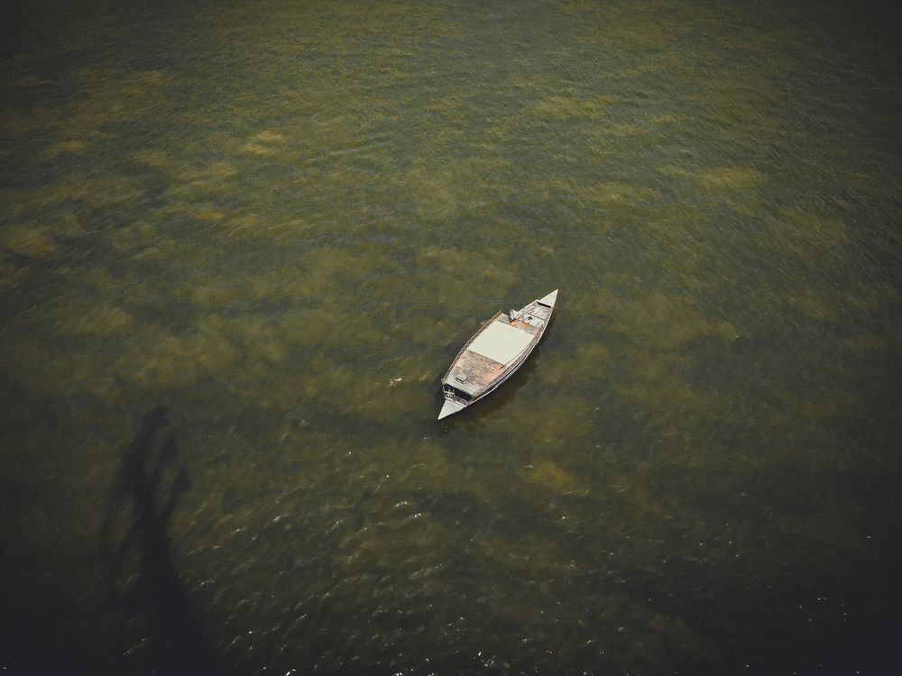 Lonely boat in River.
