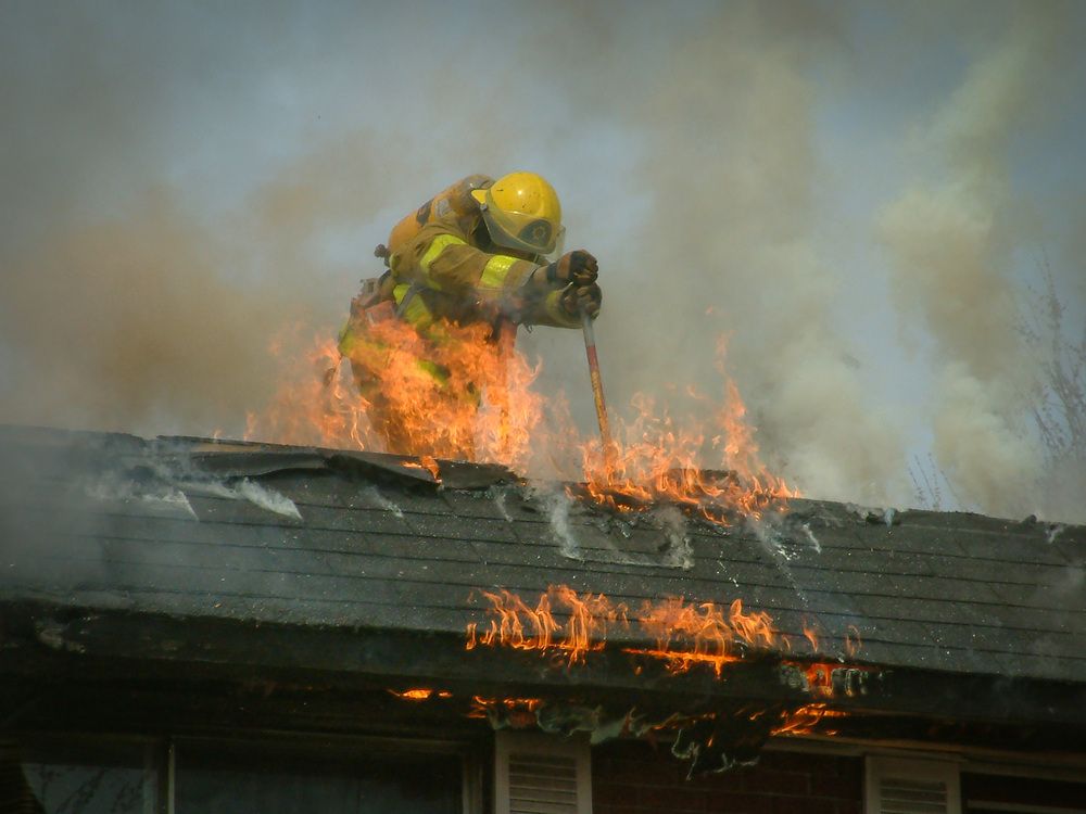 A Brave firefighter risking his life to saving others