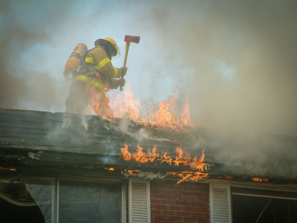 A Brave firefighter risking his life to saving others