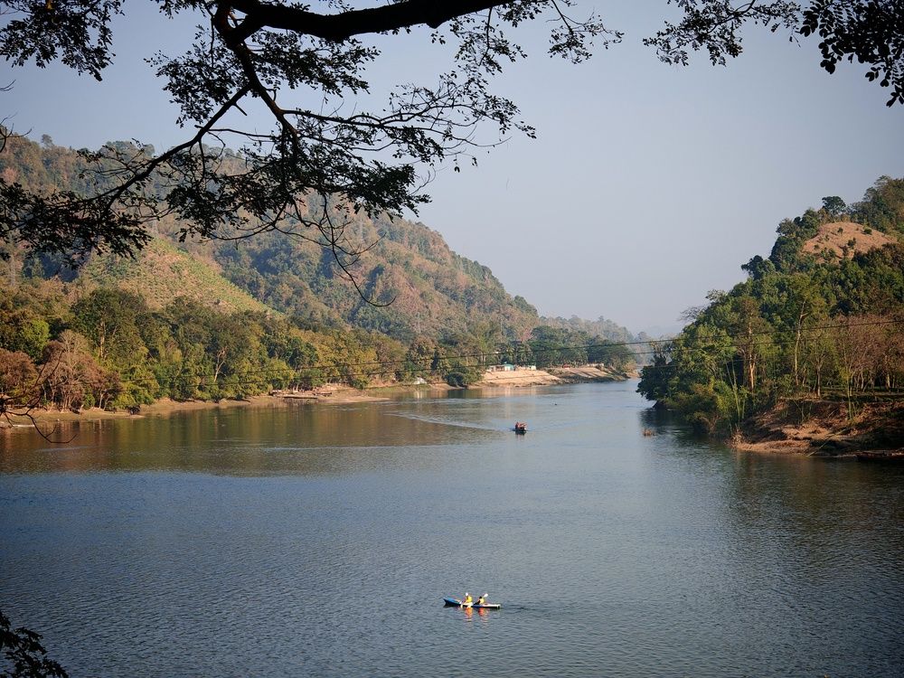Mountain, river & boat - I think there\'s a natural connection among them.