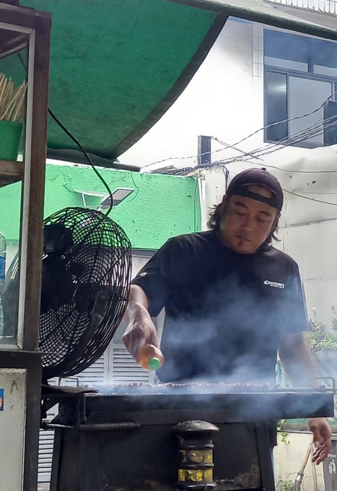 Chicken and goat satay seller