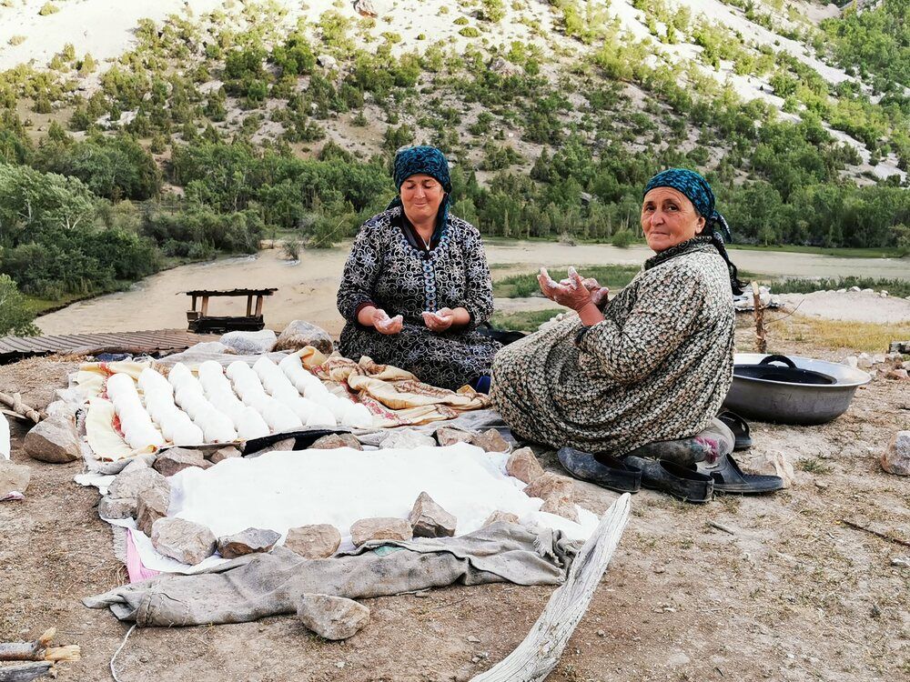 Women in Tajikistan\'s mountains making Kurut, SaryDag area