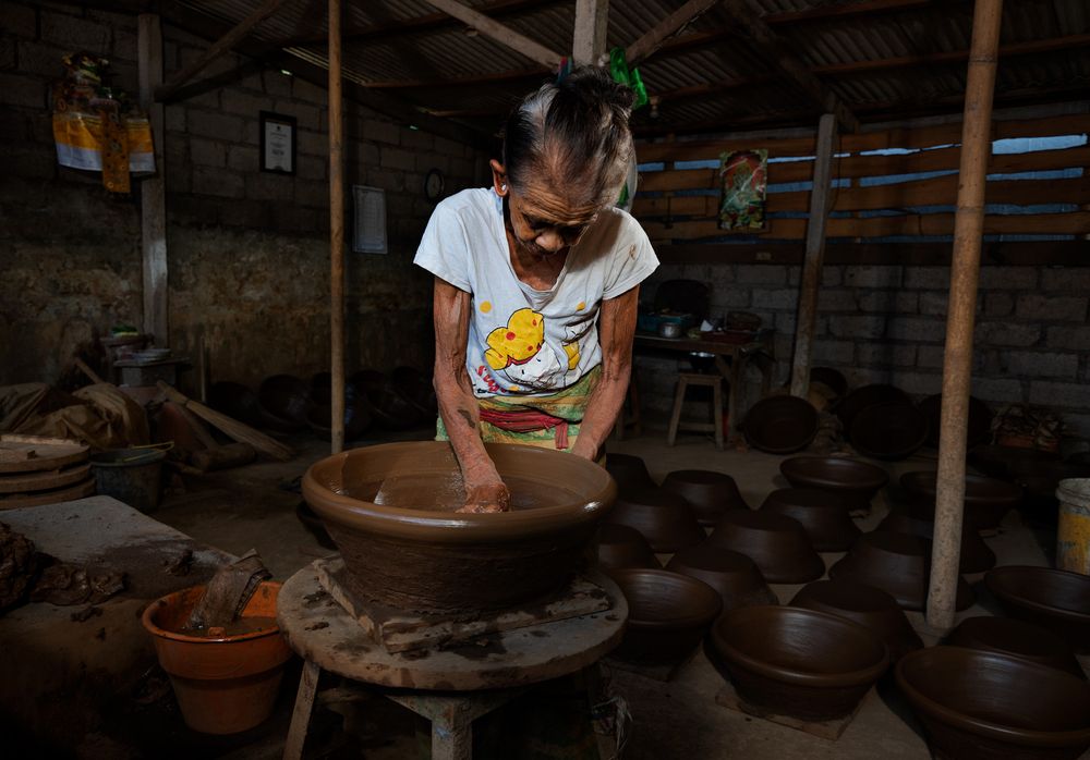 Senior handmade clay pottery maker, from Bali.