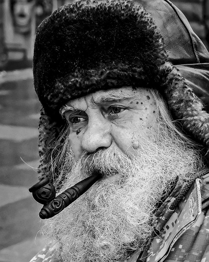 Портрет старика с трубкой.