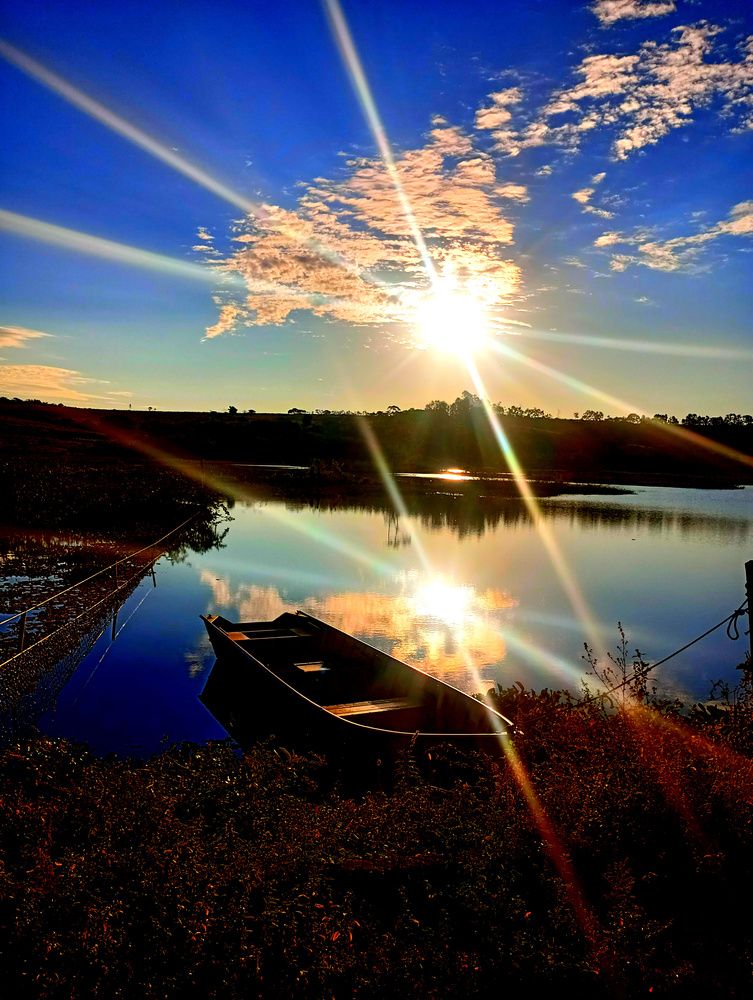 Lagoa com pôr do sol ☀️