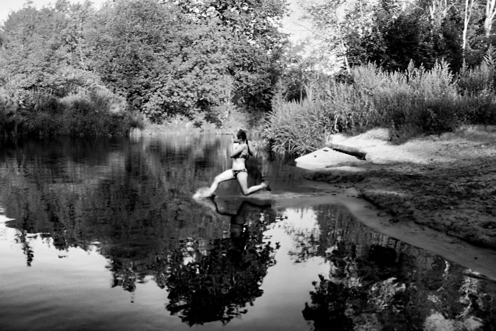 Running on the surface of the water.
