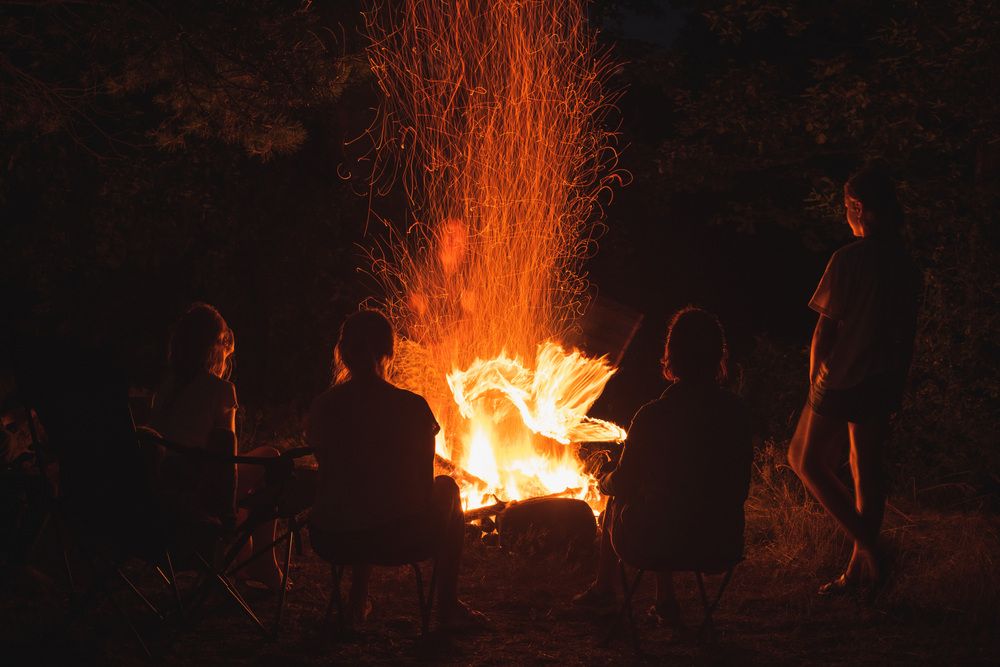 A sheaf of sparks and bright tongues of flame.