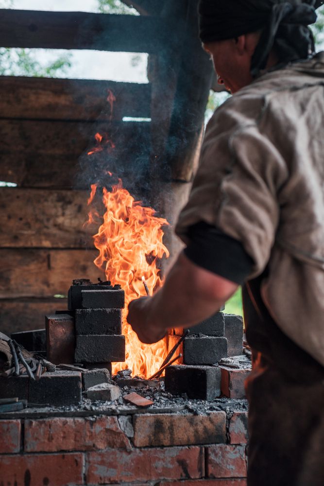 Tongues of flame in an ancient forge.