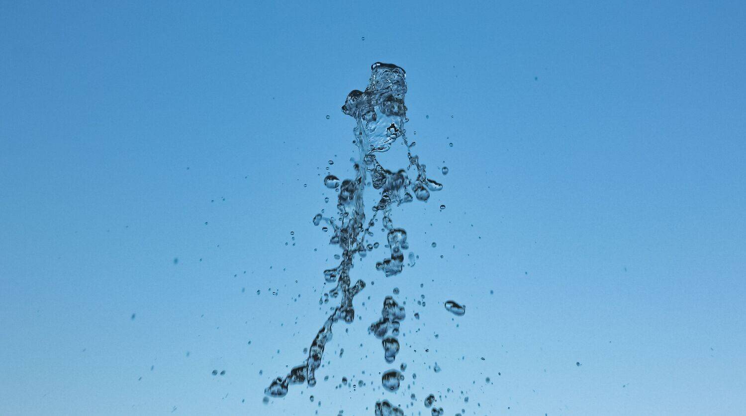 The moment with the disintegrating stream of water