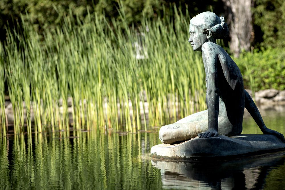 Bronze Statue of a Sitting Girl in a Pond on Margaret Island