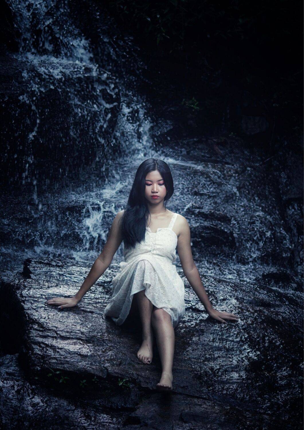 SHE The woman in front of the waterfall,The Source: Ethereal Resilience