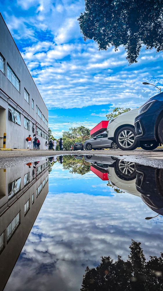 Reflections Beneath the City Sky
