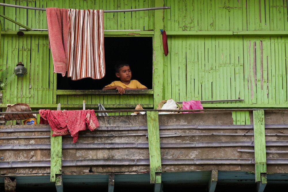 At the window