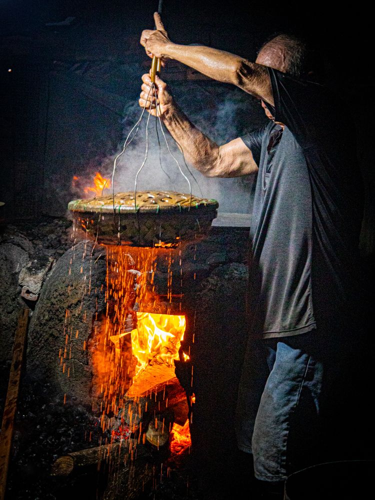 Traditional Craftsman Working by Fire