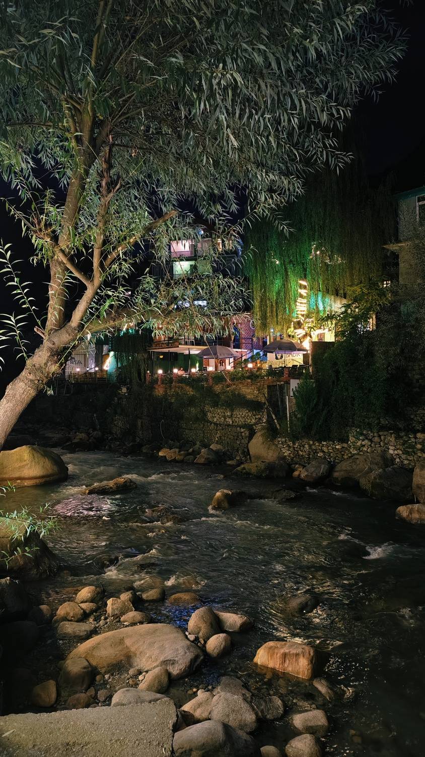 Riverside Reflections After Dark