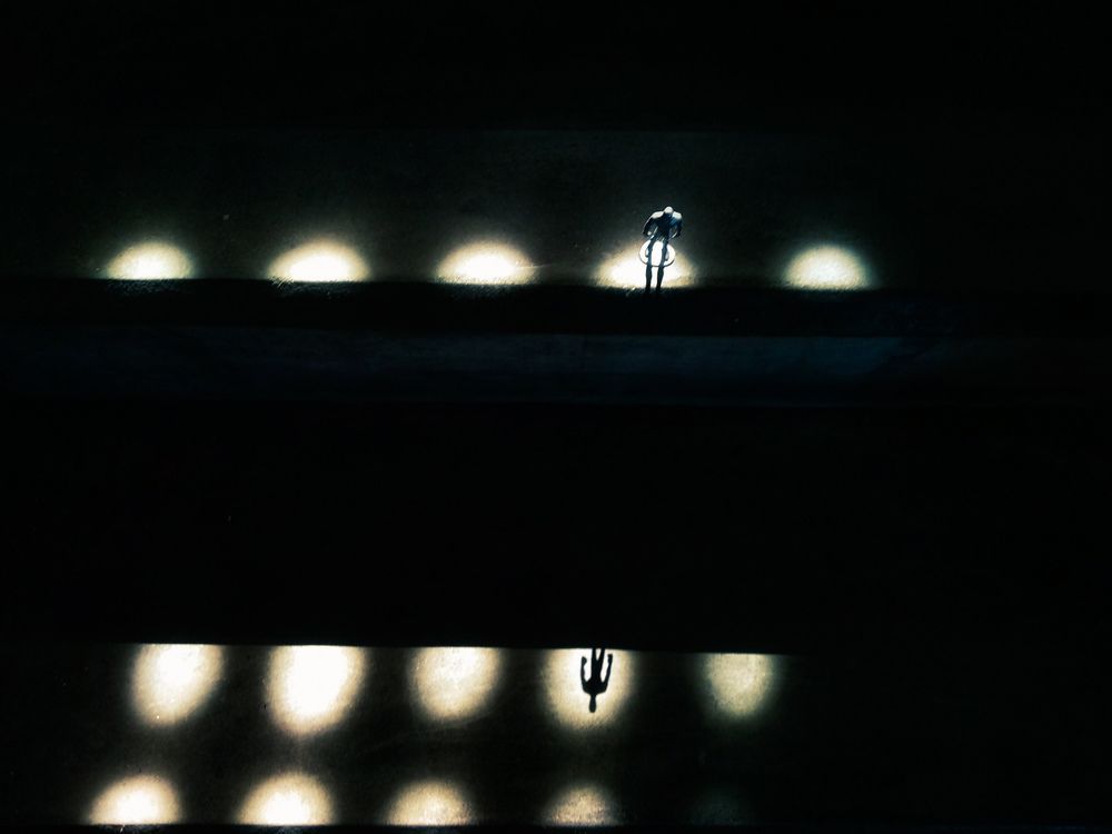 Alone Between Light and Shadow