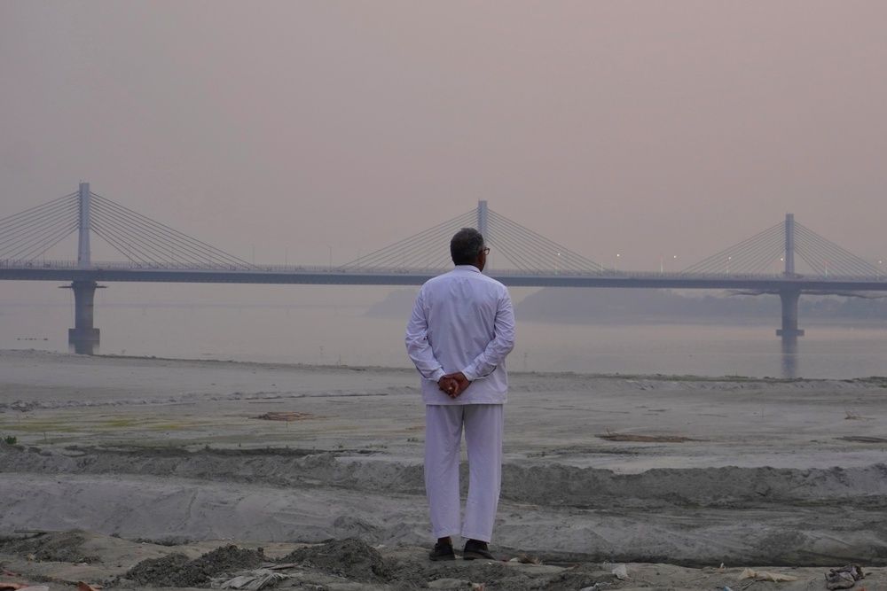 Lonely man in the river