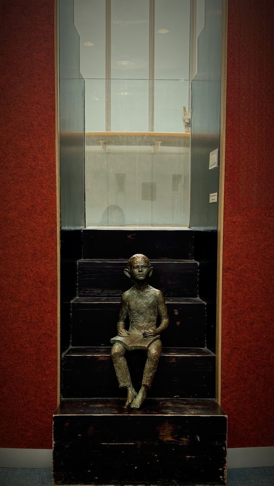 The Reader on the Black Stairs