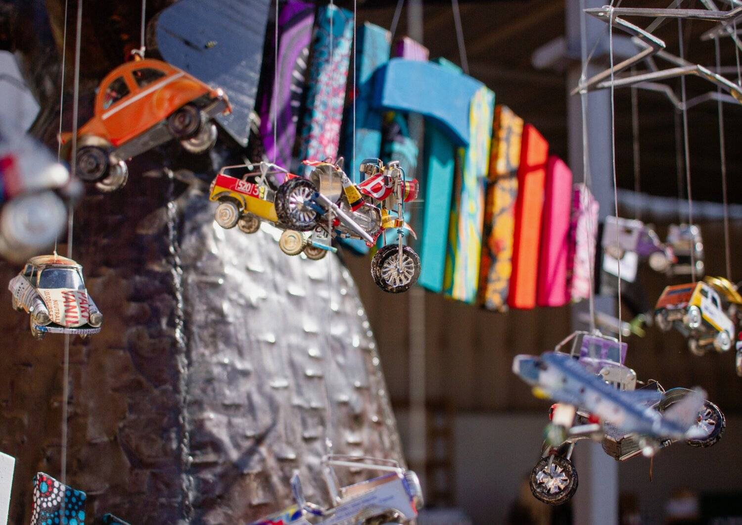 The Suspended Ballet of Miniature Vehicles