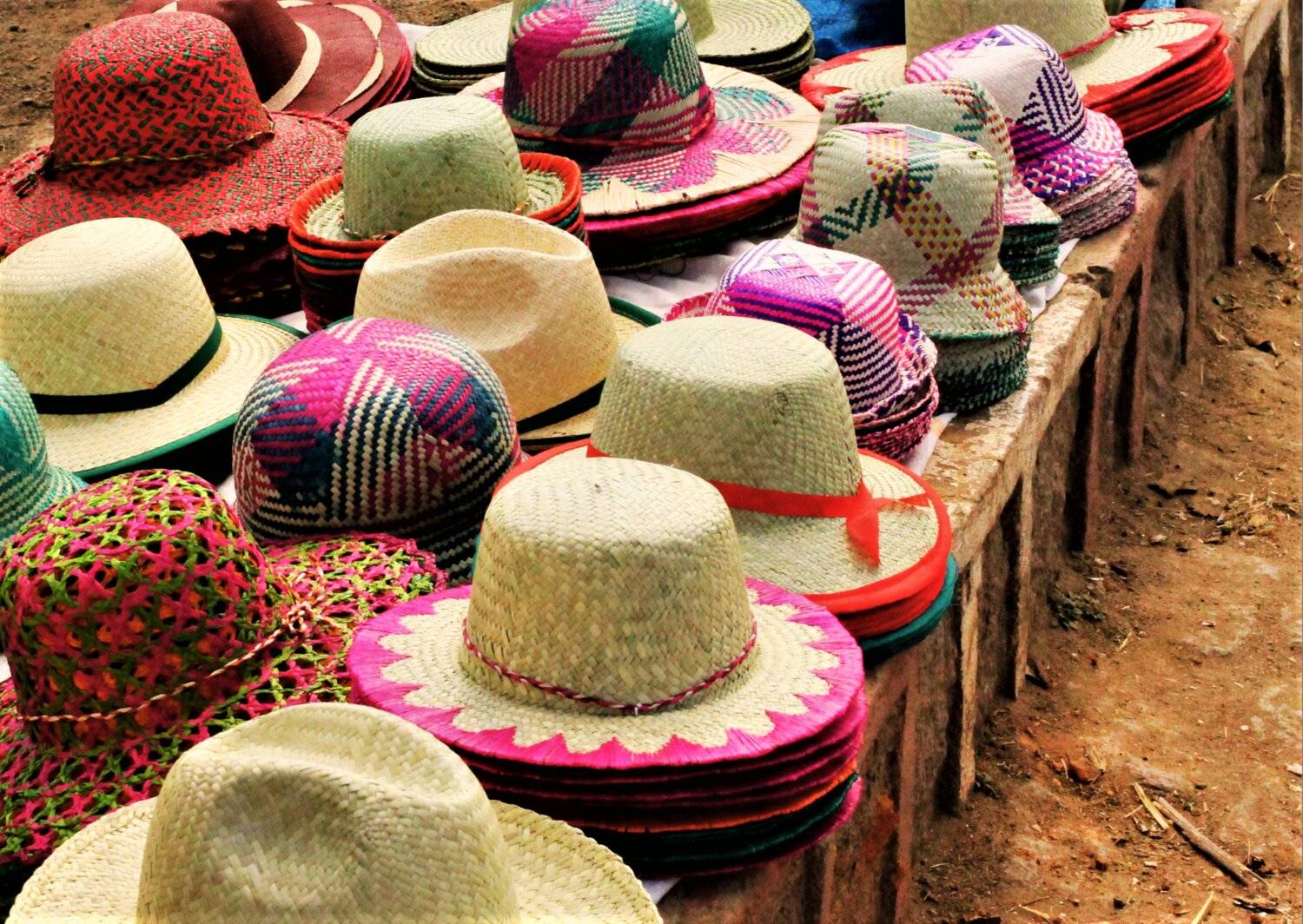 Vibrant Display of Handwoven Straw Hats