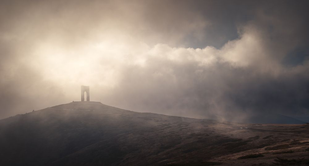 Golden drama above the arch