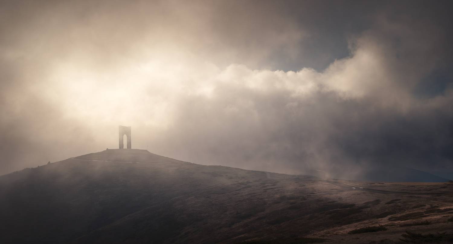 Golden drama above the arch