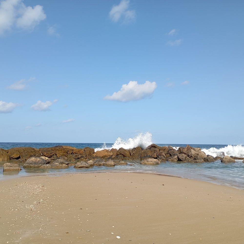 Clouds and sky, splashes in the sea.