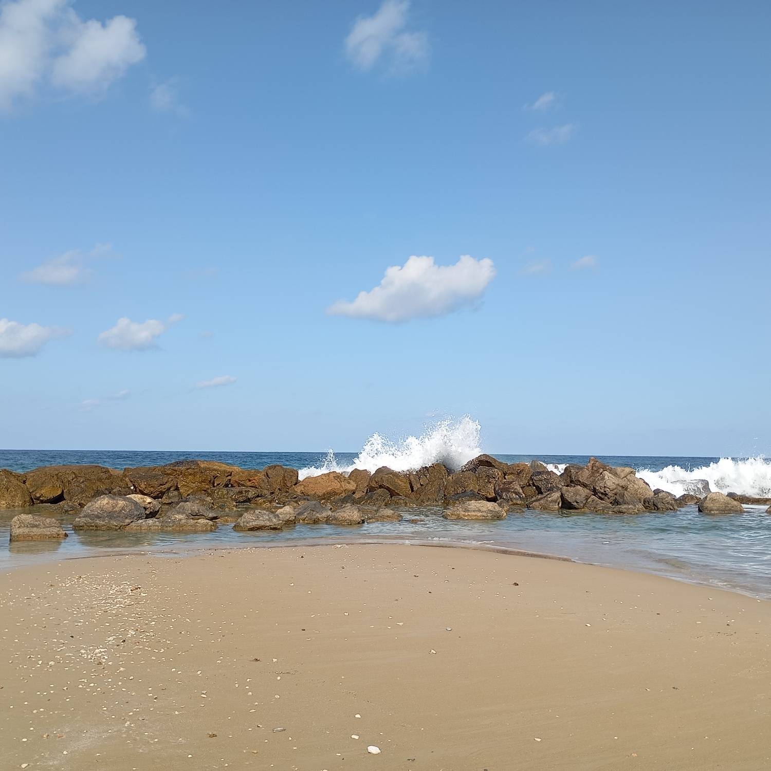 Clouds and sky, splashes in the sea.