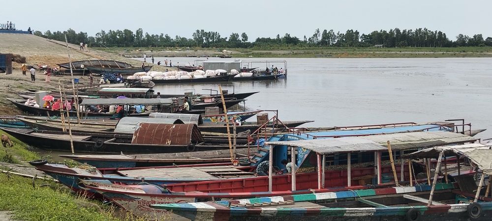 Whispers of the River: Anchored Dreams