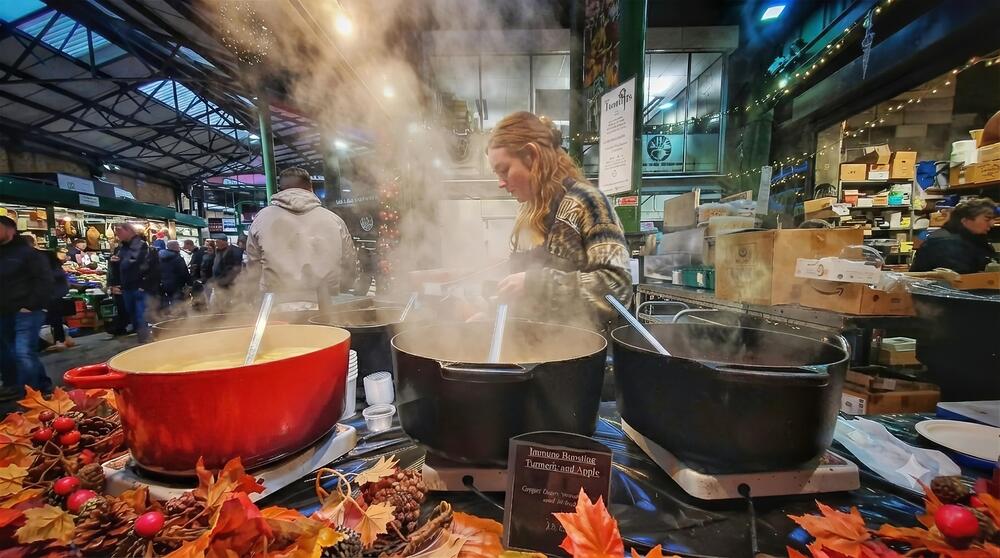 Steaming Soup at a Busy Market