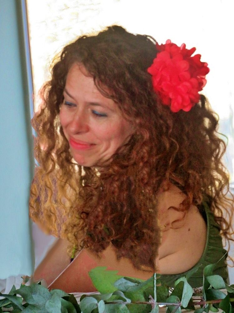Woman with flower on the hair