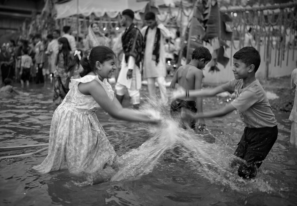 The Joy -Where devotion meets childhood, every splash becomes a memory