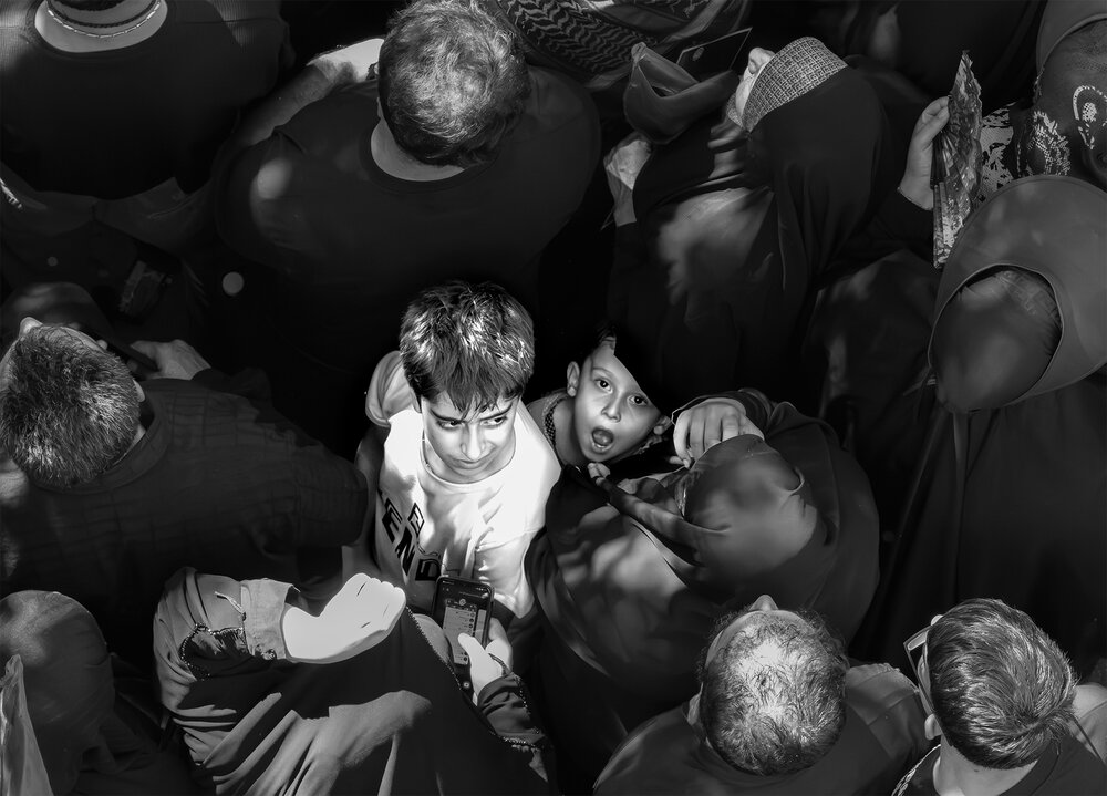 An innocent look in a crowd of people