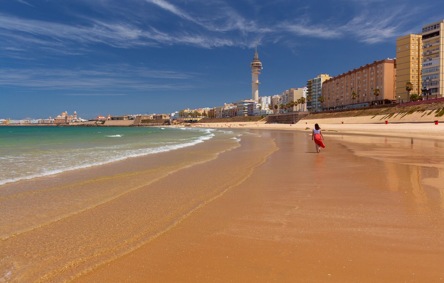 Woman Walking Along La Caleta Beach and Cadiz Waterfront, Andalusia, Spain