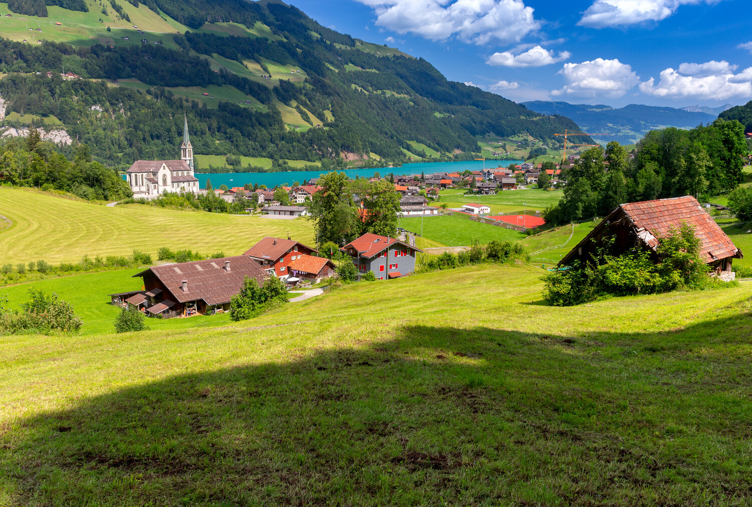 Lungern Village and Lake Surrounded by Swiss Alps