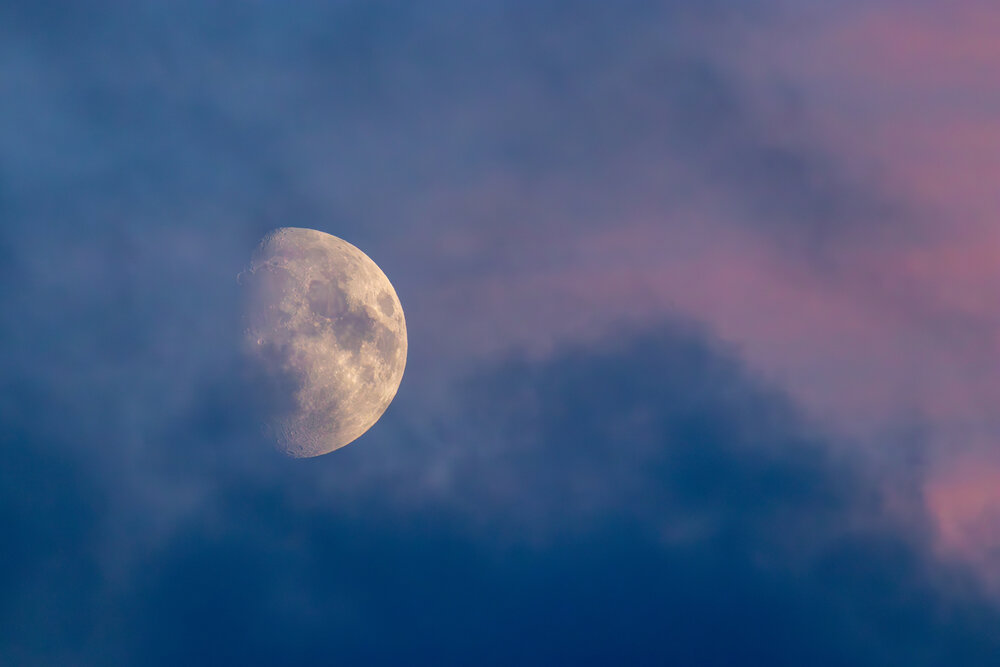 The Moon in her veils of color