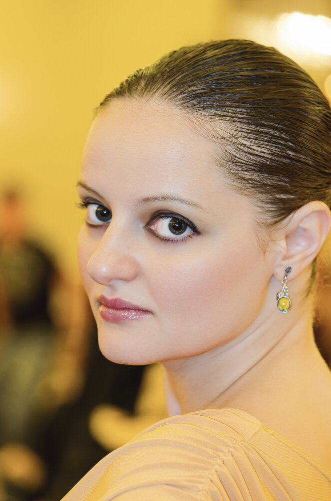 Captivating gaze of a woman in an elegant event