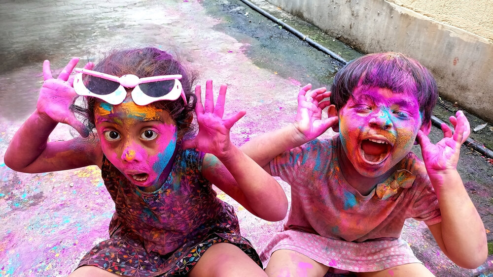 Children playing Holi