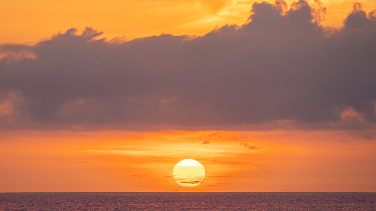 Amber Glow Over the Caribbean Horizon