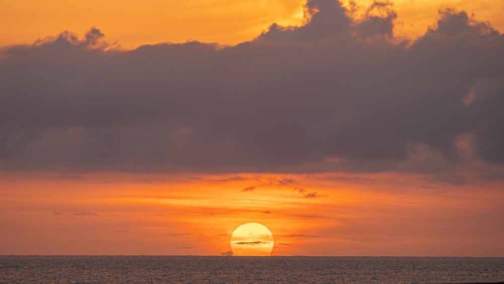 Amber Glow Over the Caribbean Horizon