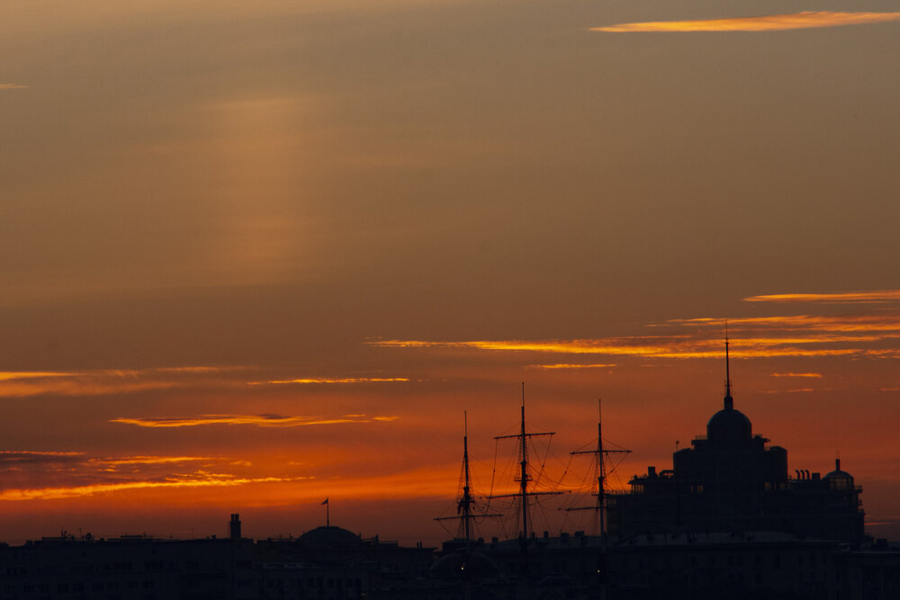 The sun rises over the Neva River
