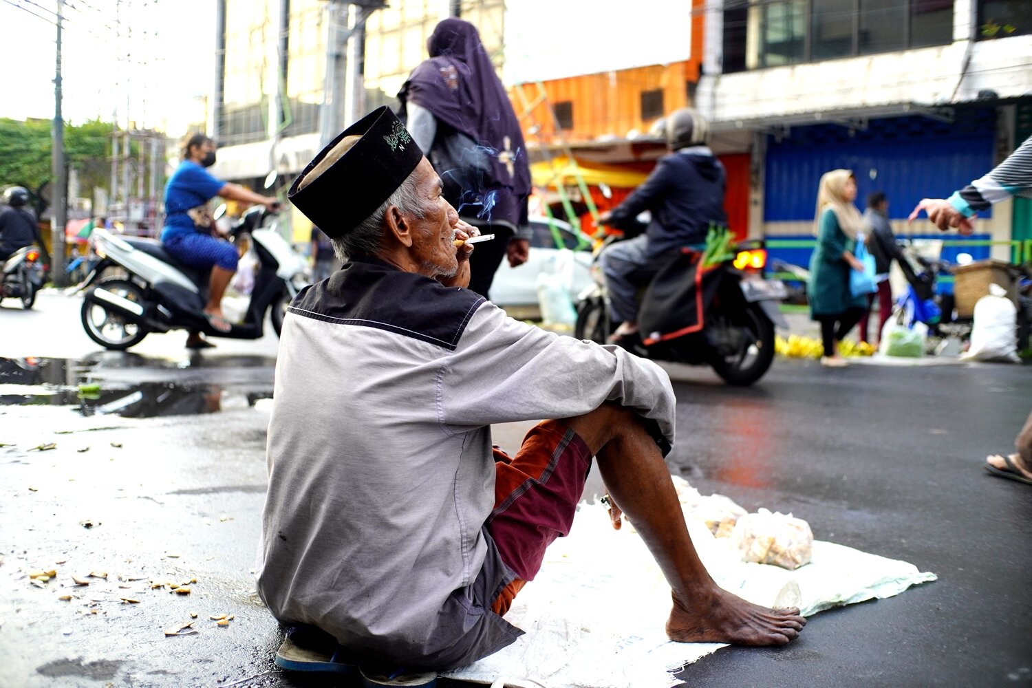 An elderly Indonesian man
