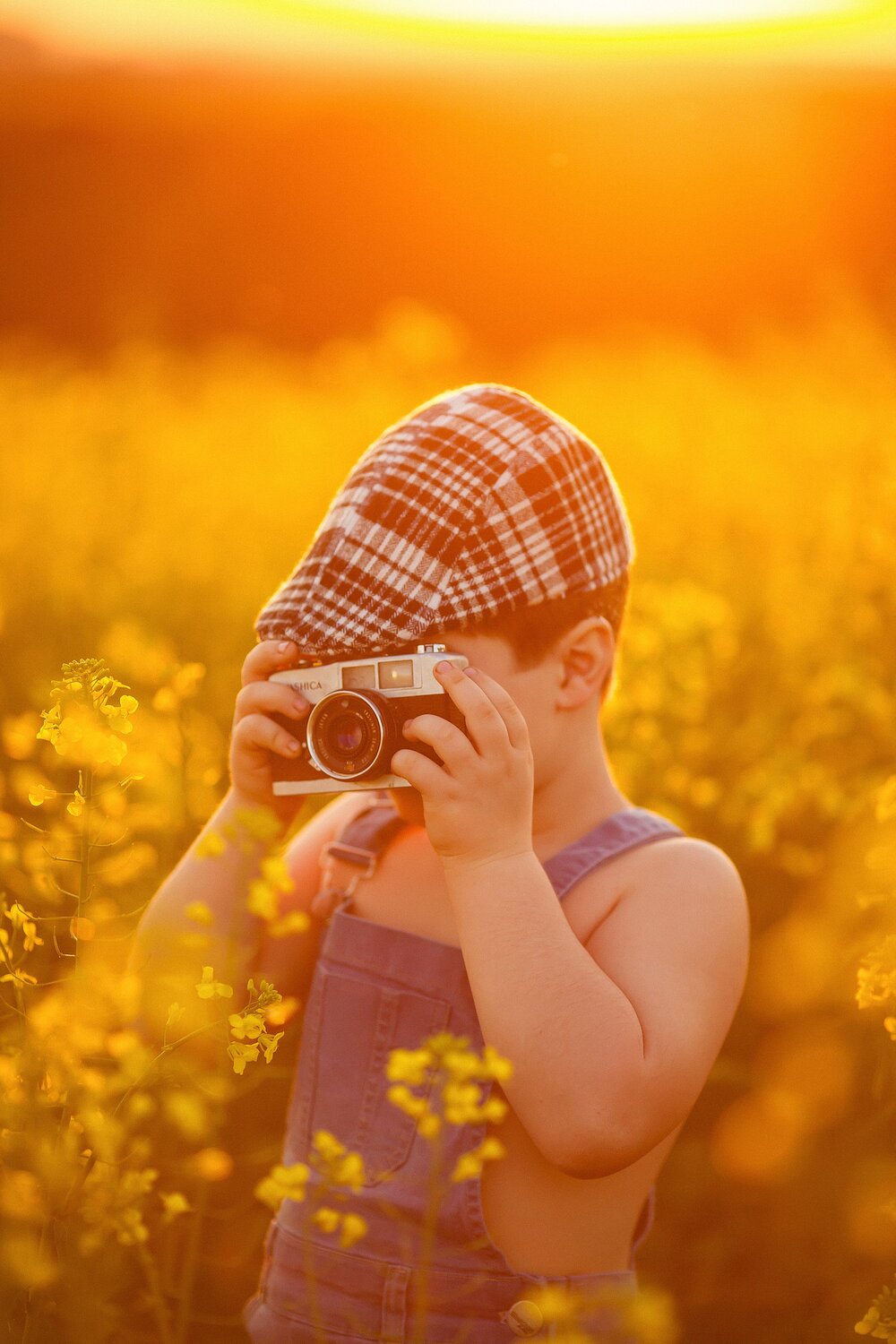 A boy and his toy camera