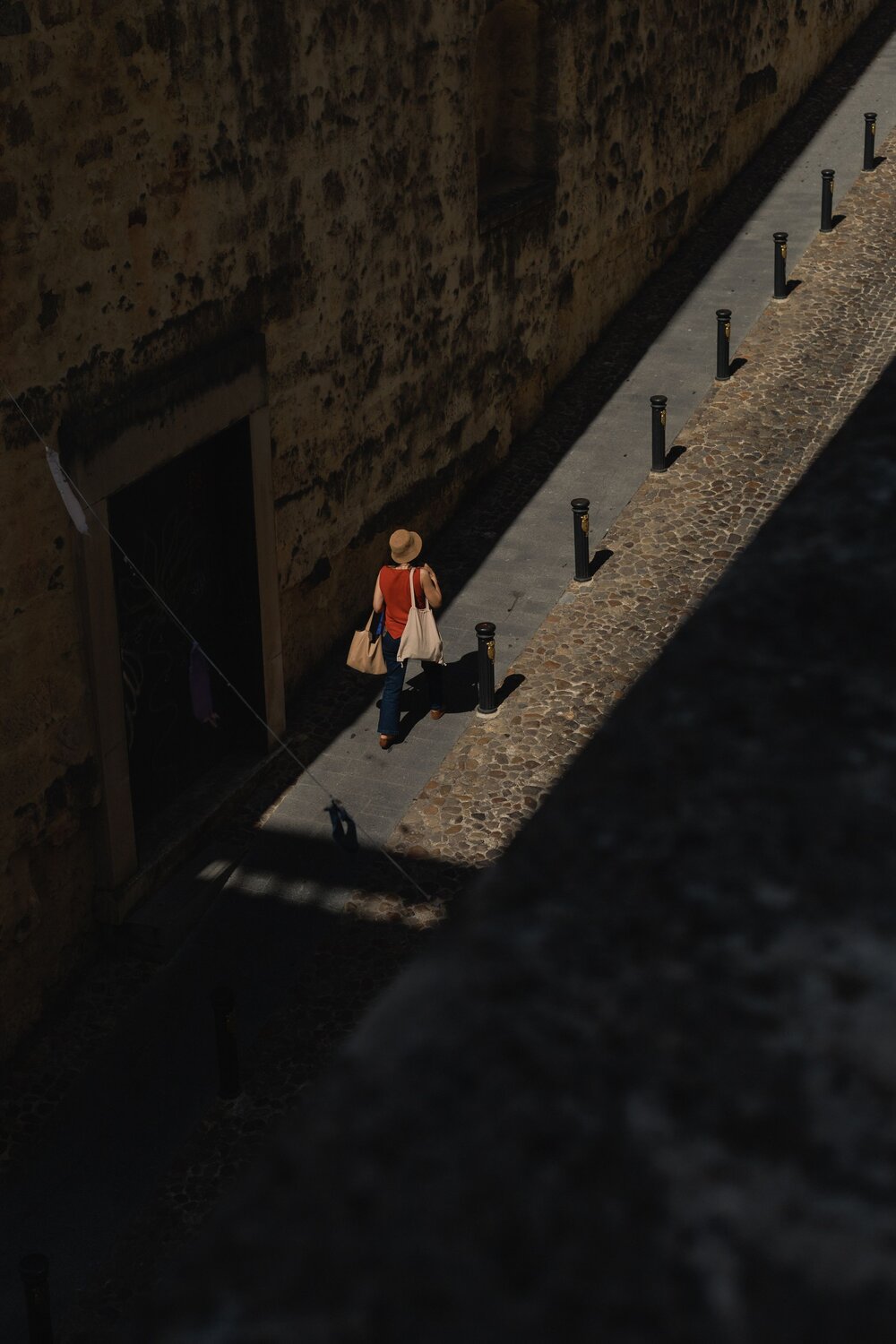 Between Light and Shadow